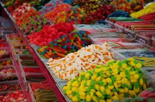 a variety of colorful candies are on display